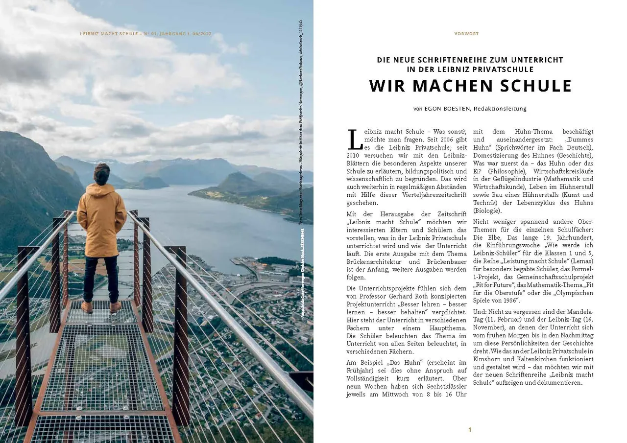 Doppelseite Wir machen Schule mit Blick von einer Aussichtsplattform in die Berge