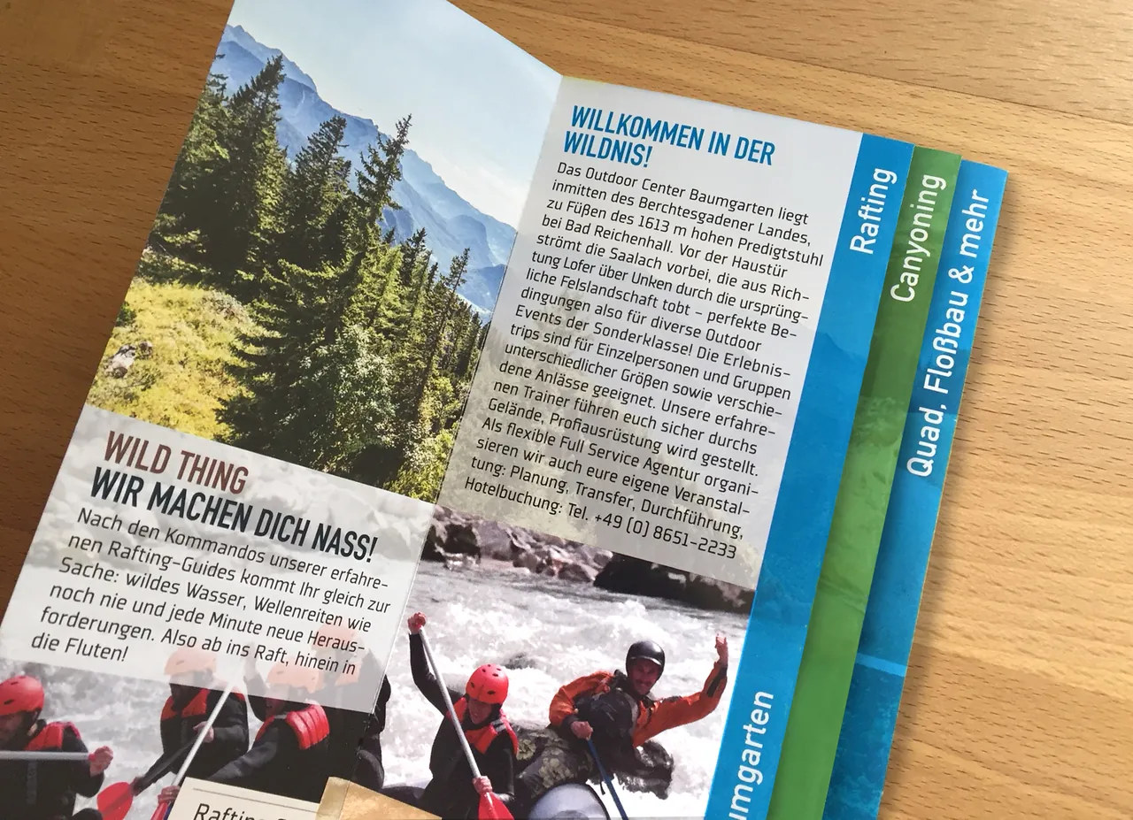 Folder des Outdoor Center Baumgarten mit Raftingfoto und dem Text Wild thing, wir machen dich nass!